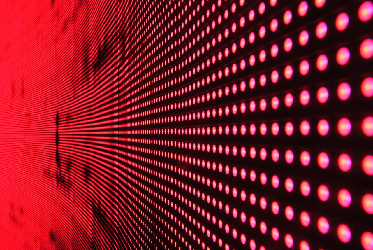 Crafting Captivating Headlines: Your awesome post title goes here Vibrant abstract pattern of illuminated red LED lights forming a dynamic design.